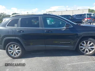2014 Jeep Cherokee Limited with VIN 1C4PJLDS9EW217074, listed as a IAAI auction lot 42705468 with 144,007 mi miles and . Bid and sale history available at DreamBid. Image 13.