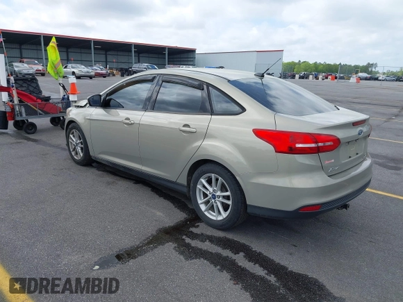 2016 Ford Focus SE with VIN 1FADP3F23GL350387, listed as a IAAI auction lot 41948782 with 70,188 mi miles. Bid and sale history available at carsss.com. Image 3.