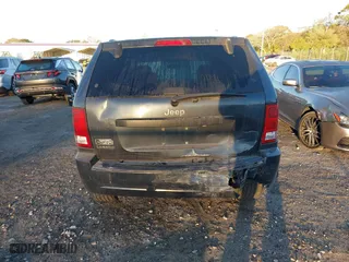 2007 Jeep Grand Cherokee Laredo with VIN 1J8GS48K17C655999, listed as a IAAI auction lot 41590500 with 290,695 mi miles. Bid and sale history available at carsss.com. Image 16.