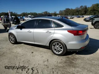 2017 Ford Focus SE with VIN 1FADP3F29HL327312, listed as a Copart auction lot 48533925 with 199,047 mi miles and Salvage Title. Bid and sale history available at carsss.com. Image 2.