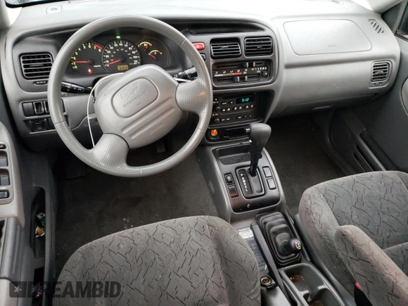 2003 Chevrolet Tracker ZR2 z VIN 2CNBJ734736946410, wystawiony jako Copart lot #82210474 z przebiegiem 61 414 mil mil oraz Szkoda całkowita • Salvage title. Historia ofert i sprzedaży dostępna na DreamBid. Obrazek 8.
