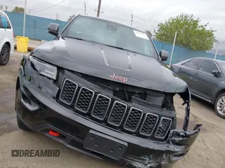 2021 Jeep Grand Cherokee Trailhawk with VIN 1C4RJFLT4MC771773, listed as a IAAI auction lot 42063954 with 17,920 mi miles and . Bid and sale history available at DreamBid. Image 12.