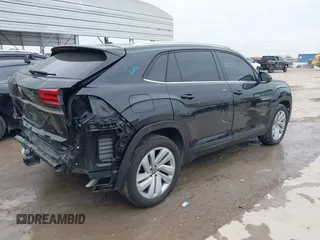 2023 Volkswagen Atlas SE z VIN 1V2KE2CA8PC225834, wystawiony jako IAAI lot #41330975 z przebiegiem 13 629 mil mil oraz . Historia ofert i sprzedaży dostępna na DreamBid. Obrazek 4.