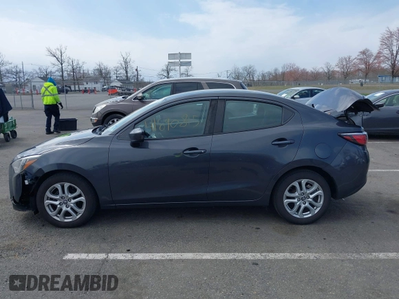 2018 Toyota Yaris with VIN 3MYDLBYV2JY321213, listed as a IAAI auction lot 41890815 with 94,089 mi miles and . Bid and sale history available at DreamBid. Image 14.