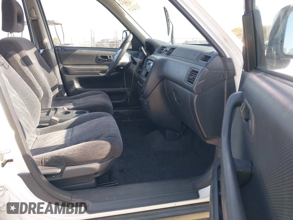 2000 Honda CR-V LX with VIN JHLRD1849YS016998, listed as a IAAI auction lot 42164944 with 124,320 mi miles and . Bid and sale history available at DreamBid. Image 5.