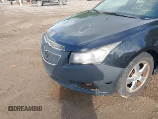 2014 Chevrolet Cruze 1LT with VIN 1G1PC5SB1E7298079, listed as a IAAI auction lot 42195963 with 204,991 mi miles and . Bid and sale history available at DreamBid. Image 6.