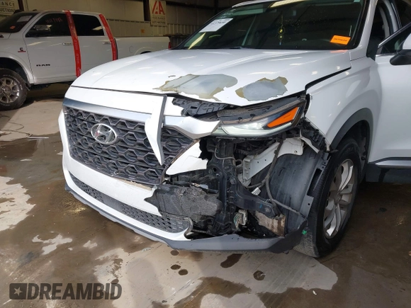 2019 Hyundai Santa Fe SE with VIN 5NMS23AD1KH063472, listed as a IAAI auction lot 41375650 with 64,496 mi miles and . Bid and sale history available at DreamBid. Image 6.
