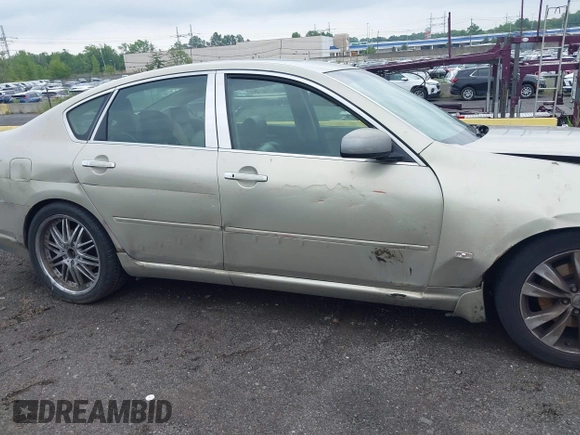 2006 Infiniti M Sport z VIN JNKBY01E06M207564, wystawiony jako IAAI lot #42384952 z przebiegiem 189 804 mil mil oraz . Historia ofert i sprzedaży dostępna na DreamBid. Obrazek 13.