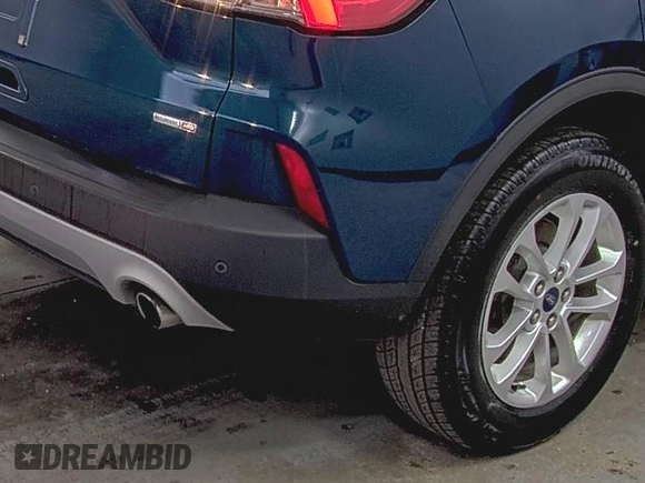 2020 Ford Escape SE with VIN 1FMCU9G65LUB80892, listed as a IAAI auction lot 42715723 with 86,362 mi miles and . Bid and sale history available at DreamBid. Image 31.