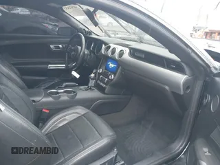 2018 Ford Mustang GT z VIN 1FA6P8CF2J5126231, wystawiony jako IAAI lot #41972432 z przebiegiem 59 402 mil mil oraz . Historia ofert i sprzedaży dostępna na DreamBid. Obrazek 5.