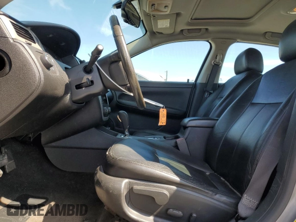 2007 Chevrolet Impala LTZ with VIN 2G1WU58R479120598, listed as a Copart auction lot 46327635 with 149,268 mi miles and Salvage Title. Bid and sale history available at DreamBid. Image 7.