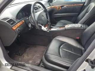 2003 Mercedes-Benz E-Class 3.2L with VIN WDBUF65J93A087012, listed as a Copart auction lot 67157614 with 146,985 mi miles and Salvage Title. Bid and sale history available at carsss.com. Image 7.