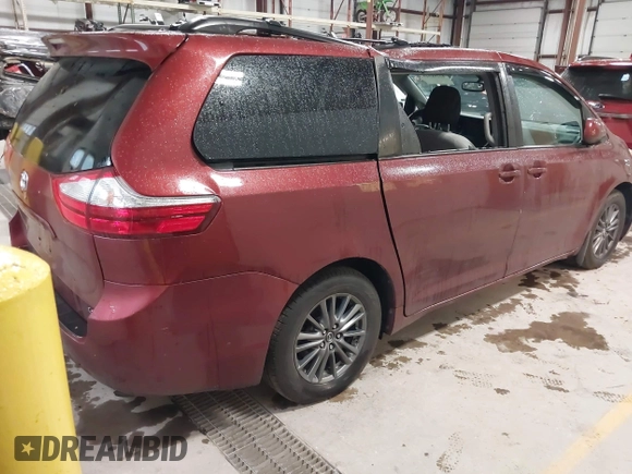 2015 Toyota Sienna LE AAS with VIN 5TDKK3DC8FS655876, listed as a IAAI auction lot 42298949 with 93,459 mi miles and . Bid and sale history available at DreamBid. Image 4.