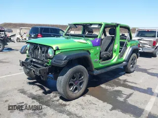 2019 Jeep Wrangler Unlimited Sport S с VIN 1C4HJXDN0KW670114, выставлен на аукционе IAAI как лот 42371823 с пробегом Не указан миль и . История ставок и продаж доступна на DreamBid. Изображение 2.