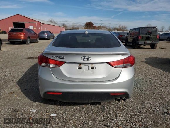 2013 Hyundai Elantra Coupe GS with VIN KMHDH6AE5DU001808, listed as a Copart auction lot 77940704 with 145,410 mi miles and Salvage Title. Bid and sale history available at carsss.com. Image 6.