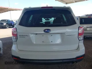 2018 Subaru Forester Touring z VIN JF2SJAWC6JH580632, wystawiony jako IAAI lot #42237986 z przebiegiem 38 446 mil mil oraz . Historia ofert i sprzedaży dostępna na DreamBid. Obrazek 14.