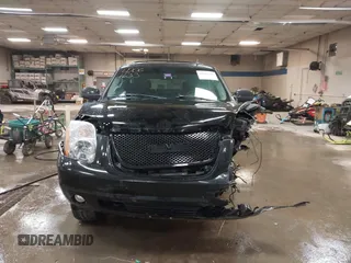 2007 GMC Yukon SLT z VIN 1GKFK13057R417047, wystawiony jako IAAI lot #42061633 z przebiegiem 183 130 mil mil oraz . Historia ofert i sprzedaży dostępna na DreamBid. Obrazek 13.
