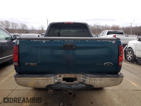 2000 Ford F-150 XL with VIN 1FTRX17W5YNA58235, listed as a Copart auction lot 84026504 with 0 mi miles and Salvage Title. Bid and sale history available at carsss.com. Image 6.