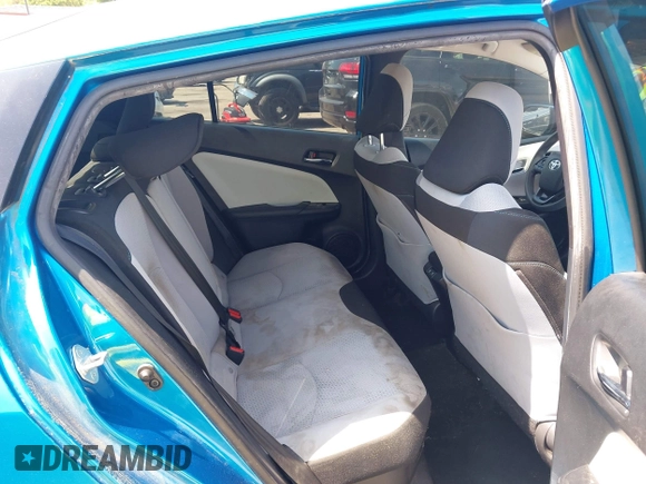 2020 Toyota Prius L Eco with VIN JTDKARFUXL3118354, listed as a IAAI auction lot 41991337 with 83,030 mi miles and . Bid and sale history available at DreamBid. Image 8.