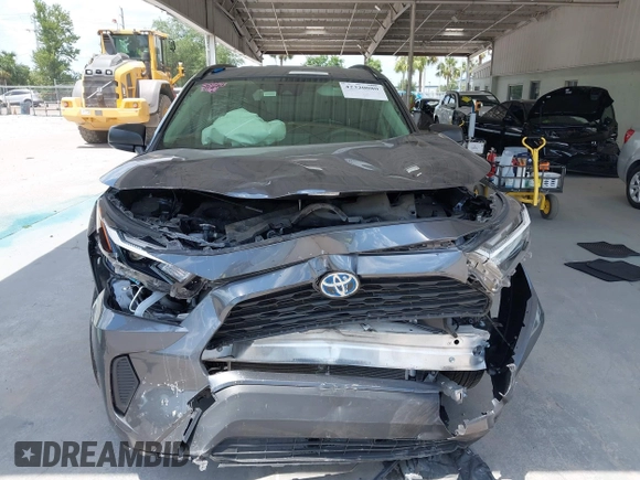 2023 Toyota RAV4 Hybrid LE with VIN JTMLWRFV6PD203044, listed as a IAAI auction lot 42320080 with 95,747 mi miles and . Bid and sale history available at DreamBid. Image 13.