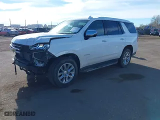 2023 Chevrolet Tahoe Premier with VIN 1GNSKSKDXPR294972, listed as a IAAI auction lot 41648292 with 50,561 mi miles. Bid and sale history available at carsss.com. Image 2.