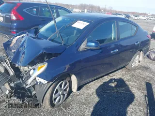 2012 Nissan Versa SL with VIN 3N1CN7AP4CL889897, listed as a IAAI auction lot 40975712 with 115,500 mi miles. Bid and sale history available at carsss.com. Image 2.