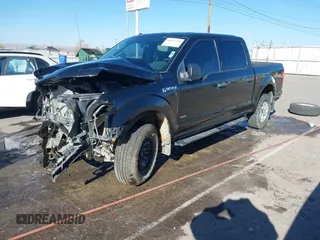 2015 Ford F-150 XLT with VIN 1FTEW1EP0FFC39327, listed as a IAAI auction lot 41012296 with 198,611 mi miles. Bid and sale history available at carsss.com. Image 18.