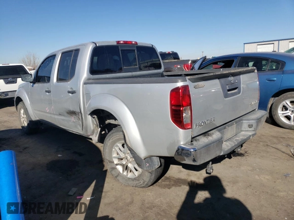 2019 Nissan Frontier SV with VIN 1N6AD0EV7KN723781, listed as a Copart auction lot 87429814 with 130,765 mi miles and Salvage title. Bid and sale history available at DreamBid. Image 2.