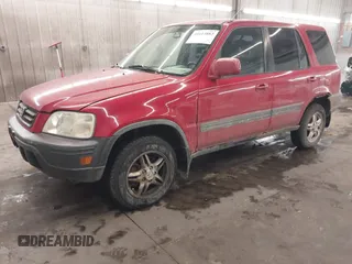 2000 Honda CR-V EX with VIN JHLRD1861YC009880, listed as a IAAI auction lot 41613882 with 238,499 mi miles. Bid and sale history available at carsss.com. Image 2.