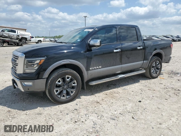 2023 Nissan Titan Platinum Reserve with VIN 1N6AA1EDXPN106467, listed as a Copart auction lot 53455215 with 56,061 mi miles and Salvage title. Bid and sale history available at DreamBid. Image 1.