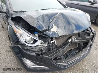 2014 Hyundai Elantra SE with VIN KMHDH4AE0EU087194, listed as a IAAI auction lot 41992825 with 59,484 mi miles. Bid and sale history available at carsss.com. Image 6.