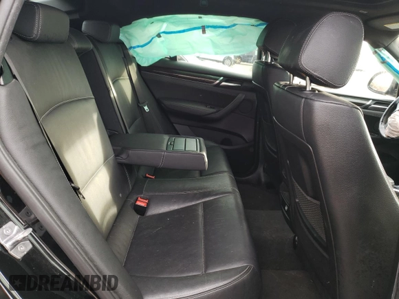 2016 BMW X4 xDrive28i with VIN 5UXXW3C55G0R22729, listed as a Copart auction lot 72906833 with 98,668 mi miles. Bid and sale history available at carsss.com. Image 11.
