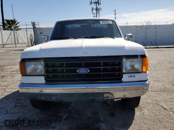 1989 Ford F-150 with VIN 1FTDF15Y6KKB77485, listed as a Copart auction lot 48943525 with 95,808 mi miles and Salvage Title. Bid and sale history available at carsss.com. Image 5.