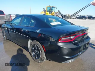 2020 Dodge Charger SXT with VIN 2C3CDXBG1LH123864, listed as a IAAI auction lot 41984310 with 117,828 mi miles and . Bid and sale history available at carsss.com. Image 3.