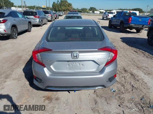 2020 Honda Civic LX with VIN 19XFC2F62LE009433, listed as a IAAI auction lot 40963670 with 117,865 mi miles and . Bid and sale history available at DreamBid. Image 16.