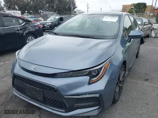 2021 Toyota Corolla SE with VIN JTDS4MCE8MJ065982, listed as a IAAI auction lot 41734972 with 59,039 mi miles. Bid and sale history available at carsss.com. Image 2.