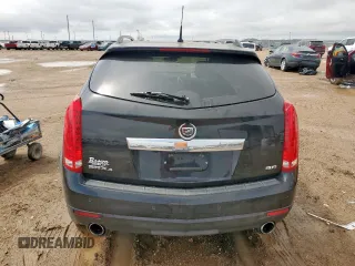 2013 Cadillac SRX Premium Collection с VIN 3GYFNJE39DS650569, выставлен на аукционе Copart как лот 59947905 с пробегом 146 548 миль миль и Списание • Salvage title. История ставок и продаж доступна на DreamBid. Изображение 6.