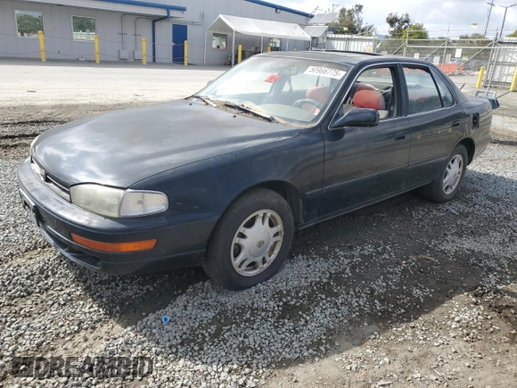 1994 Toyota Camry XLE with VIN JT2GK13E0R0012242, listed as a Copart auction lot 50966775 with 70,922 mi miles and Salvage Title. Bid and sale history available at carsss.com. Image 1.