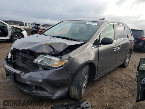 2011 Honda Odyssey EX-L with VIN 5FNRL5H65BB029311, listed as a Copart auction lot 81916724 with 184,034 mi miles and Salvage Title. Bid and sale history available at DreamBid. Image 1.