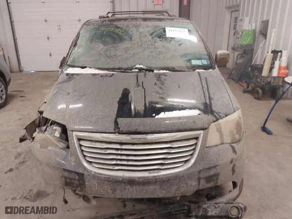 2013 Chrysler Town & Country Touring-L with VIN 2C4RC1CGXDR677260, listed as a IAAI auction lot 41197632 with 159,334 mi miles. Bid and sale history available at carsss.com. Image 12.