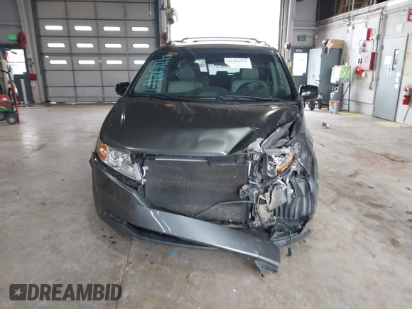 2011 Honda Odyssey Touring с VIN 5FNRL5H90BB025855, выставлен на аукционе IAAI как лот 42104979 с пробегом 165 010 миль миль и . История ставок и продаж доступна на DreamBid. Изображение 13.