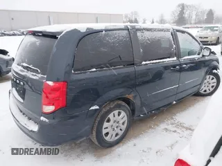2013 Dodge Grand Caravan SE with VIN 2C4RDGBGXDR746630, listed as a IAAI auction lot 41239381 with 213,421 mi miles and . Bid and sale history available at DreamBid. Image 4.