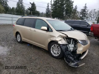 2011 Toyota Sienna XLE AAS with VIN 5TDYK3DC7BS124835, listed as a Copart auction lot 52324145 with 119,260 mi miles and Salvage Title. Bid and sale history available at carsss.com. Image 4.