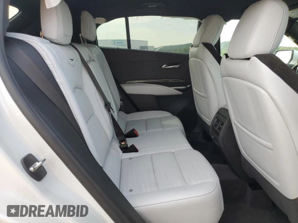 2024 Cadillac XT4 AWD Sport с VIN 1GYFZFR47RF125557, выставлен на аукционе Copart как лот 70869104 с пробегом 8 714 миль миль и Списание • Salvage title. История ставок и продаж доступна на DreamBid. Изображение 11.