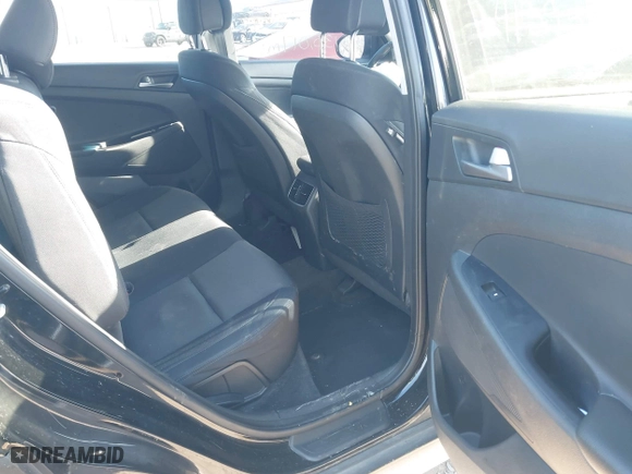 2017 Hyundai Tucson Value with VIN KM8J33A24HU343231, listed as a IAAI auction lot 41395327 with 133,017 mi miles. Bid and sale history available at carsss.com. Image 8.