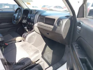 2011 Jeep Patriot Latitude with VIN 1J4NT1GB5BD245263, listed as a IAAI auction lot 41942376 with 215,147 mi miles. Bid and sale history available at carsss.com. Image 5.