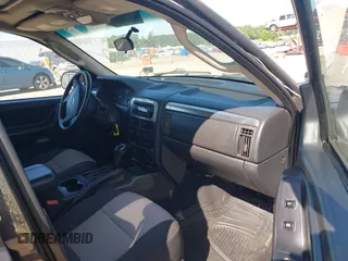 2004 Jeep Grand Cherokee Laredo z VIN 1J4GX48S04C281660, wystawiony jako IAAI lot #42551161 z przebiegiem 173 209 mil mil oraz . Historia ofert i sprzedaży dostępna na DreamBid. Obrazek 5.