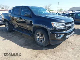 2018 Chevrolet Colorado 4WD Z71 z VIN 1GCGTDEN0J1173420, wystawiony jako IAAI lot #41971813 z przebiegiem 98 499 mil mil oraz . Historia ofert i sprzedaży dostępna na DreamBid. Obrazek 1.