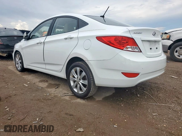 2012 Hyundai Accent GLS with VIN KMHCU4AEXCU069242, listed as a Copart auction lot 61475315 with 136,591 mi miles and Salvage title. Bid and sale history available at DreamBid. Image 2.