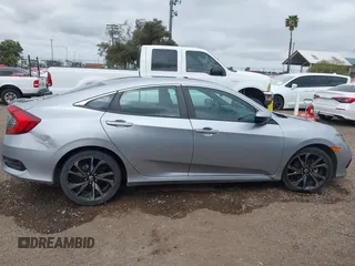 2021 Honda Civic Sport with VIN 2HGFC2F83MH510243, listed as a IAAI auction lot 41856857 with 95,739 mi miles and . Bid and sale history available at DreamBid. Image 13.